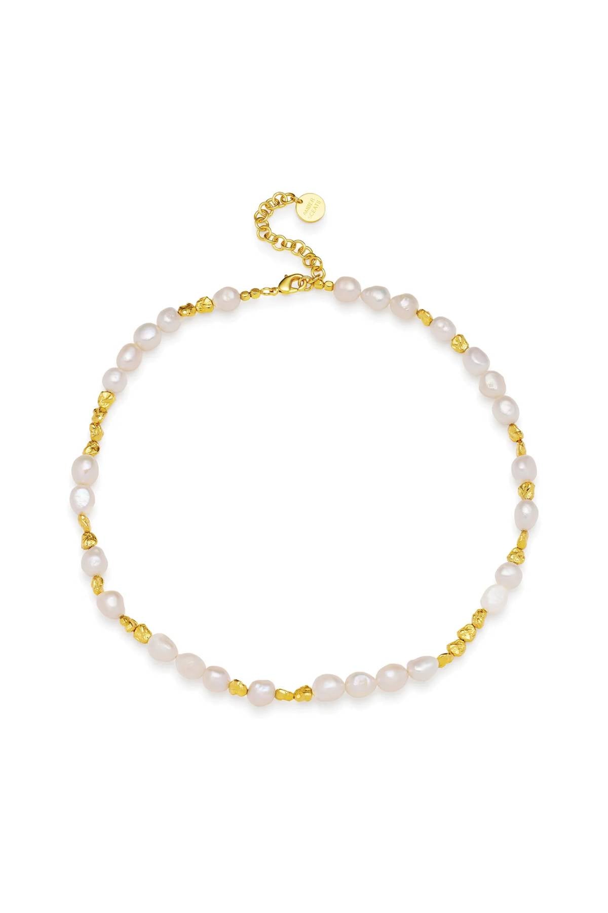 ChatGPT said:

Portofino Necklace by Amber Sceats, handcrafted in Italy with AAA+ freshwater pearls and 24K gold-plated beads for timeless sophistication.