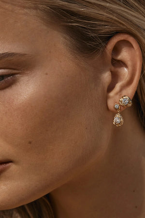 Chia Earrings by Amber Sceats - gold earrings with crushed texture and crystal detail, designed for elegant everyday styling.