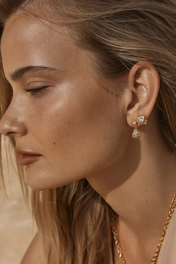 Chia Earrings by Amber Sceats - gold earrings with crushed texture and crystal detail, designed for elegant everyday styling.