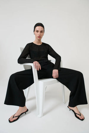 Chispa Top Black by Onte - sheer chiffon top with rhinestone detail and asymmetric hem, designed for a modern evening look.