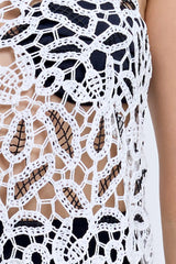 Chloe Dress With Underlayer Powder by Pfeiffer – monochrome crochet dress with scalloped edging, adjustable straps and matching underlayer shorts.