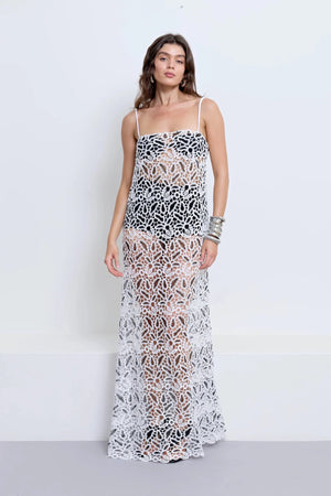 Chloe Dress With Underlayer Powder by Pfeiffer – monochrome crochet dress with scalloped edging, adjustable straps and matching underlayer shorts.