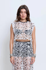Chloe Top Powder by Pfeiffer – cropped monochrome crochet top with crew neckline and keyhole back detail.