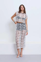 Chloe Top Powder by Pfeiffer – cropped monochrome crochet top with crew neckline and keyhole back detail.