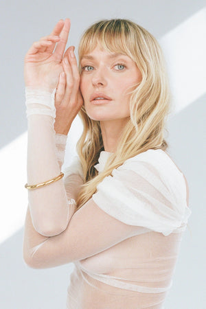 Chubby Tube Bangle Gold by Porter Jewellery – chunky 8mm gold vermeil bangle on sterling silver base, waterproof and hypoallergenic design.
