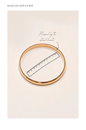 Chubby Tube Bangle Gold by Porter Jewellery – chunky 8mm gold vermeil bangle on sterling silver base, waterproof and hypoallergenic design.
