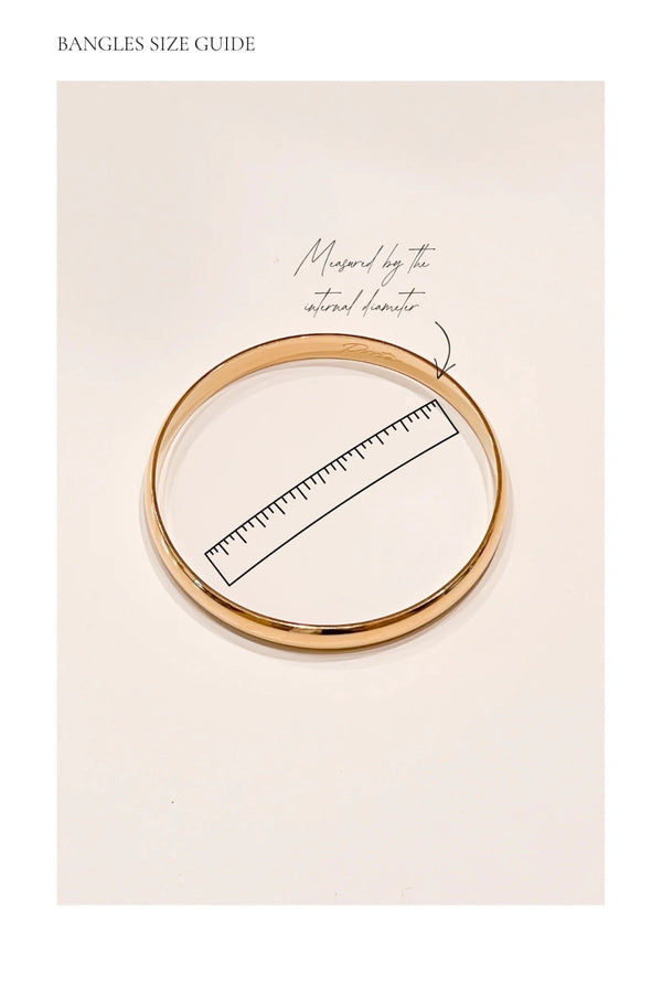 Chubby Tube Bangle Gold by Porter Jewellery – chunky 8mm gold vermeil bangle on sterling silver base, waterproof and hypoallergenic design.
