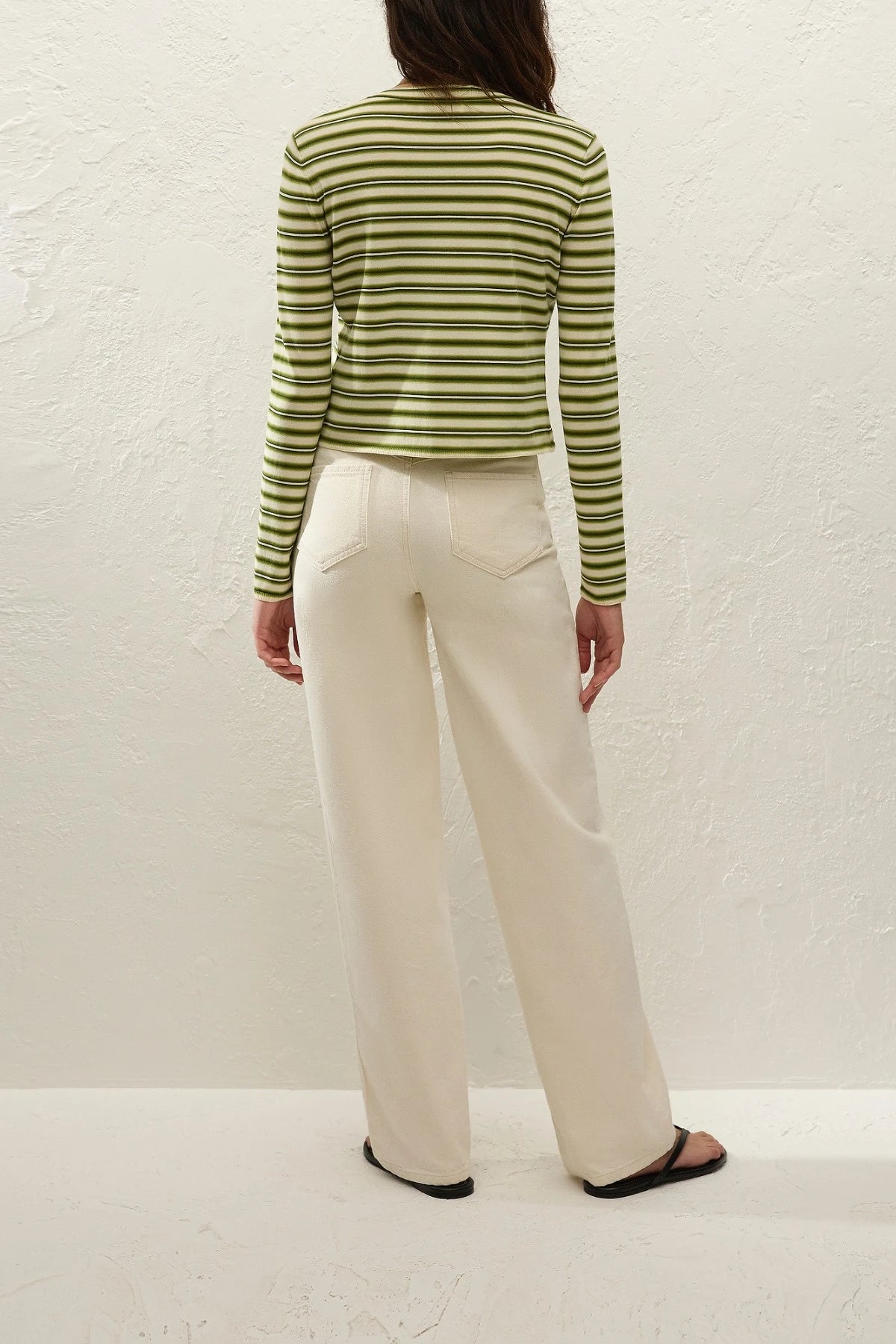 Cinta Cardigan by Faithfull the Brand — an ombré striped knit cardigan with a rounded neckline and fitted sleeves, perfect for easy layering.