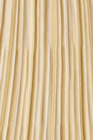 Citara Drawstring Skirt Butter Stripe by Faithfull the Brand, striped midi skirt with elastic waist. Perfect for summer outfits or relaxed chic looks.