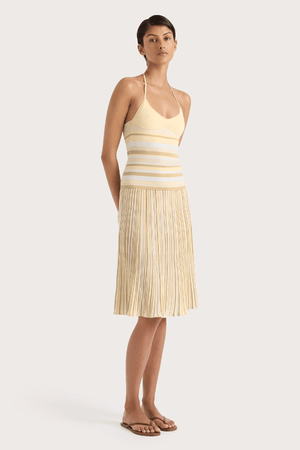 Citara Drawstring Skirt Butter Stripe by Faithfull the Brand, striped midi skirt with elastic waist. Perfect for summer outfits or relaxed chic looks.