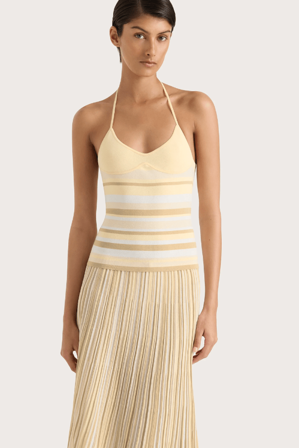 Citara Drawstring Skirt Butter Stripe by Faithfull the Brand, striped midi skirt with elastic waist. Perfect for summer outfits or relaxed chic looks.