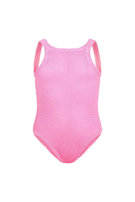 Classic Swim in Bubblegum by Hunza G, a soft crinkle one-piece for ages 3–6. Perfect for twirls, beach days, and playful adventures.