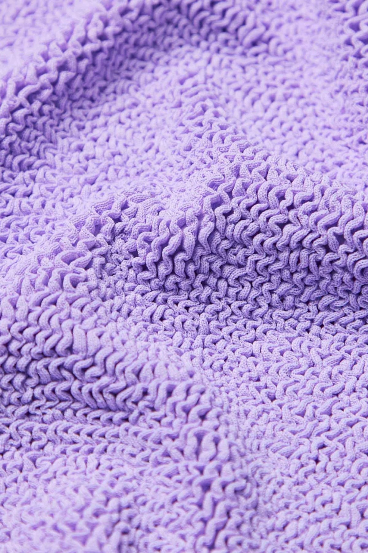 Classic Swim in Lilac by Hunza G, stretchy crinkle one-piece designed for ages 7–12. Ideal for sunny vacations and swim play.