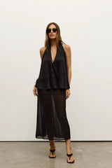 Clea Halter Top in Black by Bayse, a lightweight halter top with a plunging neckline and open back for elevated summer styling.