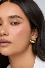 Clemmie Maxi Earrings Gold by Heaven Mayhem - sculptural ribbed statement earrings in 18k gold plated stainless steel, perfect for bold everyday styling.