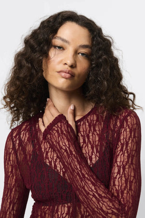 Close To You Top Bordeaux by Mossman - sheer lace long sleeve top with crew neckline and thumbholes, perfect for sleek layering or statement styling.