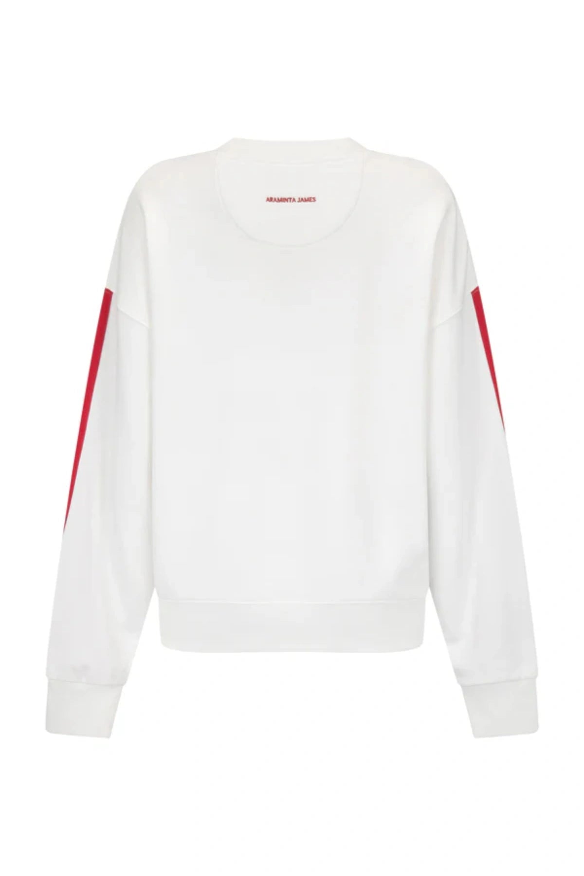 Club Med Sweatshirt in Warm White by Araminta James, soft cotton fleece with red sleeve panels and velvet chest applique, relaxed fit for chic off-duty or travel styling.