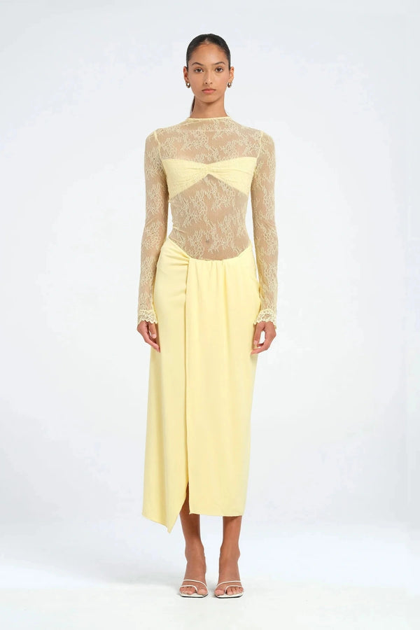 Colton Midi Dress Butter by Benni – A trendy high-neck lace dress with elegant open back, built-in bralette, and soft jersey skirt with thigh-high split, perfect for sophisticated daytime and evening events