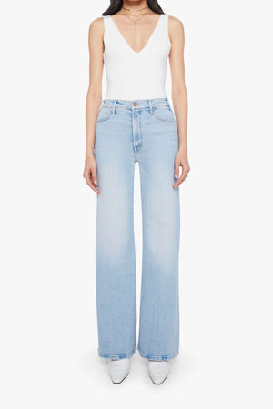 Complete 360 Jeans by MOTHER – high-rise wide leg jeans in light blue stretch denim. Perfect for vintage-inspired styling.