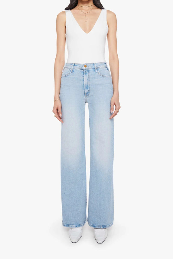 Complete 360 Jeans by MOTHER – high-rise wide leg jeans in light blue stretch denim. Perfect for vintage-inspired styling.