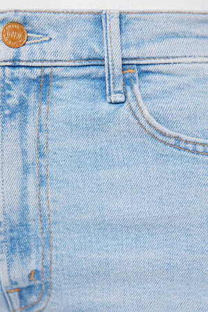 Complete 360 Jeans by MOTHER – high-rise wide leg jeans in light blue stretch denim. Perfect for vintage-inspired styling.