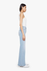 Complete 360 Jeans by MOTHER – high-rise wide leg jeans in light blue stretch denim. Perfect for vintage-inspired styling.