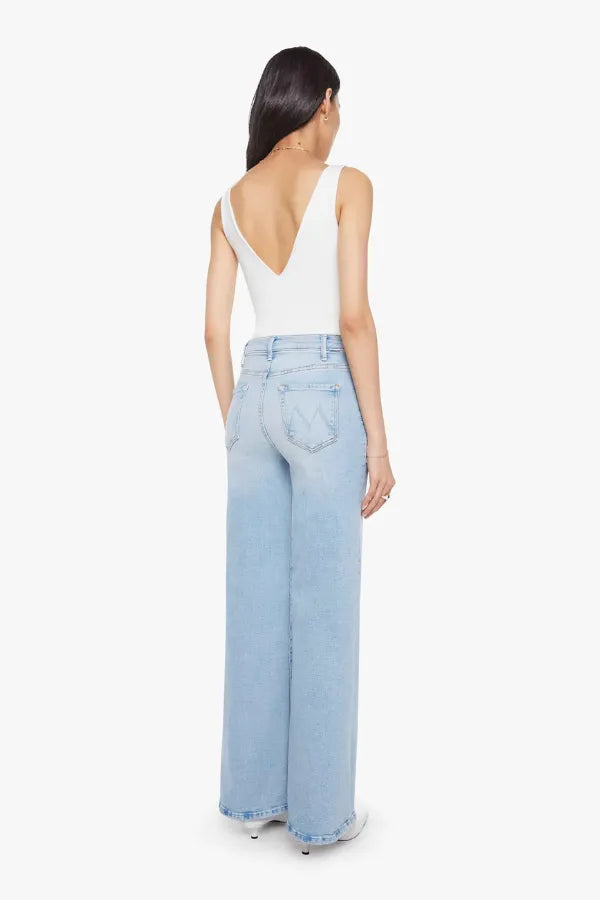 Complete 360 Jeans by MOTHER – high-rise wide leg jeans in light blue stretch denim. Perfect for vintage-inspired styling.