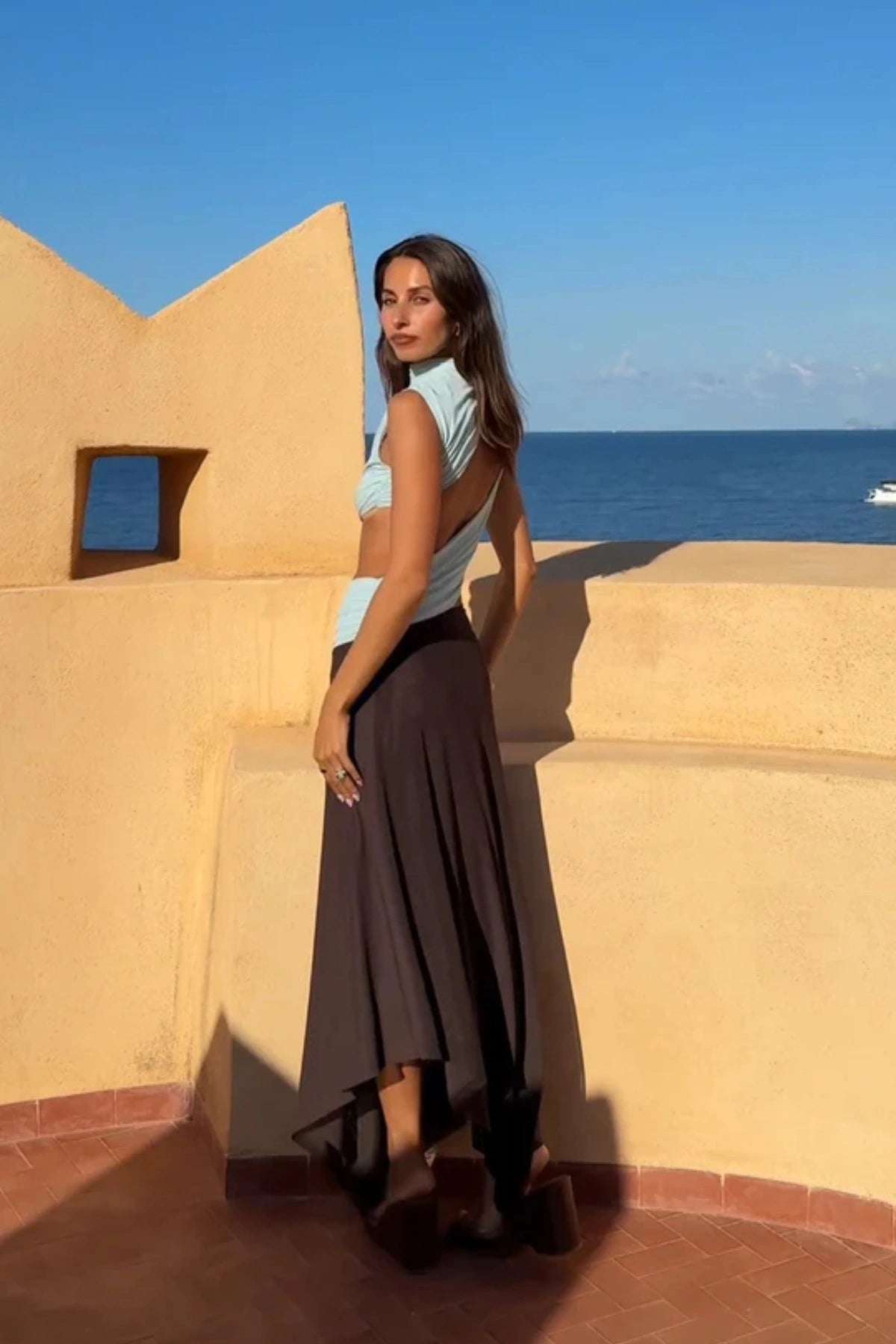 Conni Asym Midi Dress by Bec + Bridge, a two-tone mesh silhouette with cut-out waist, gathered sash, and raw hem for sculptural evening allure.