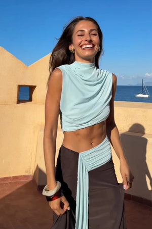 Conni Asym Midi Dress by Bec + Bridge, a two-tone mesh silhouette with cut-out waist, gathered sash, and raw hem for sculptural evening allure.