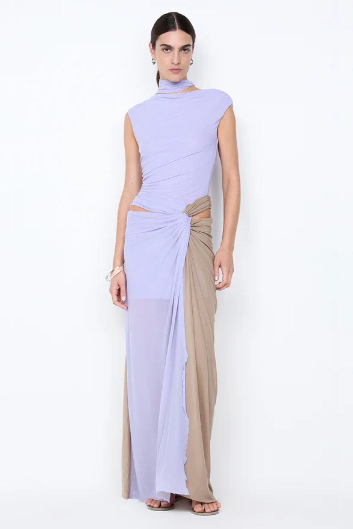 Conni Twist Maxi Dress by Bec + Bridge, a two-tone mesh gown with hip cutouts and scarf neck. Perfect for formal or evening events.
