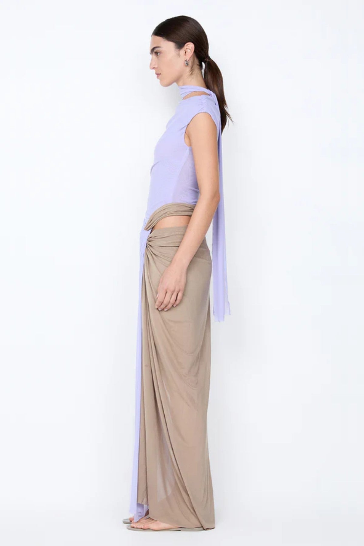 Conni Twist Maxi Dress by Bec + Bridge, a two-tone mesh gown with hip cutouts and scarf neck. Perfect for formal or evening events.