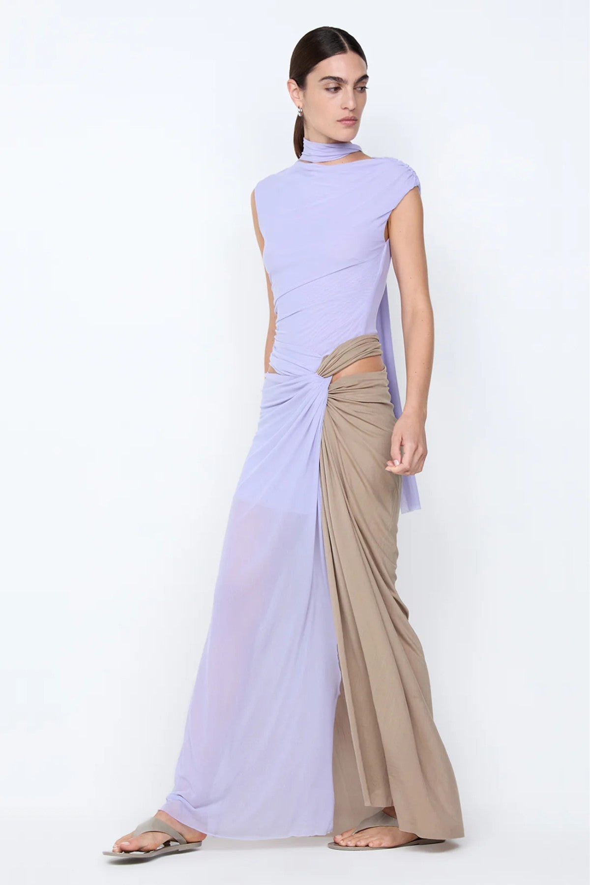 Conni Twist Maxi Dress by Bec + Bridge, a two-tone mesh gown with hip cutouts and scarf neck. Perfect for formal or evening events.