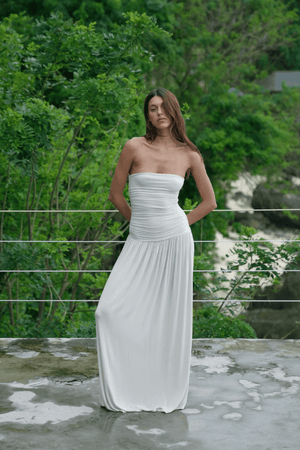 Leah Dress Baby by Bayse – A chic strapless maxi with ruched bodice and stretchy fabric for a flattering fit, ideal for formal events and elegant evenings.