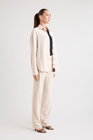 Pino Trouser natural by Pfeiffer, mid-rise tailored pants with front pleats and side pockets, perfect for day-to-night wear and office to evening events.