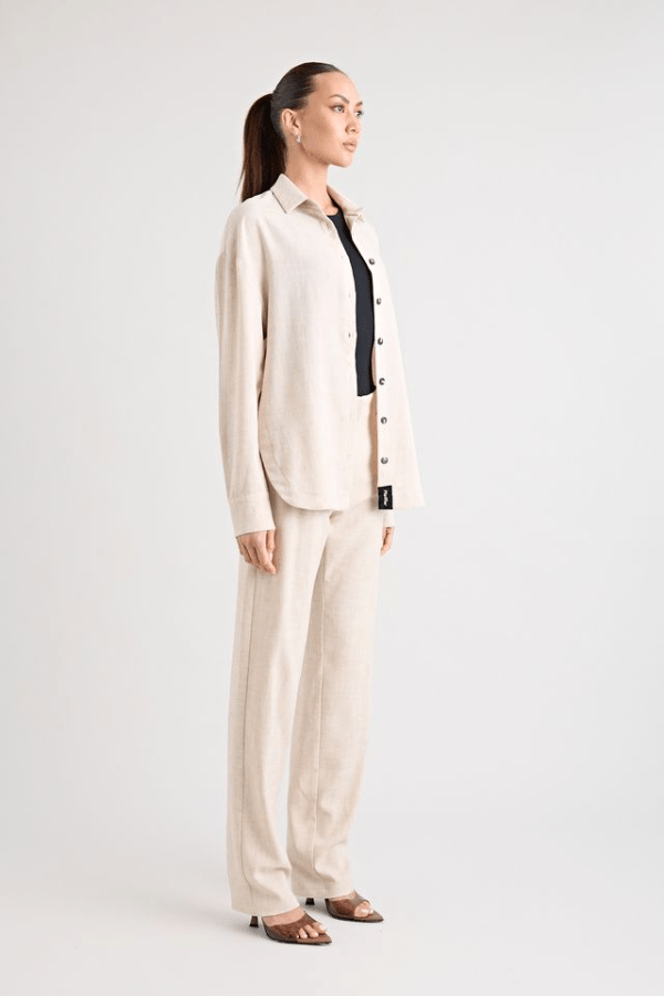 Pino Trouser natural by Pfeiffer, mid-rise tailored pants with front pleats and side pockets, perfect for day-to-night wear and office to evening events.