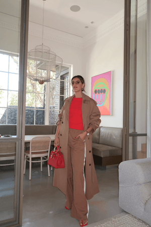 Denver Pant Tan by Sneaky Link, relaxed fit with elastic waist, contrast side stripe, and drawstring for a sporty look. Made from polyester blend. Cold hand wash. Size down if between sizes.