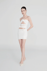 Coari Off White by Maygel Coronel – Ruched cutout halter mini dress with 3D flowers and adjustable straps for versatile wear.
