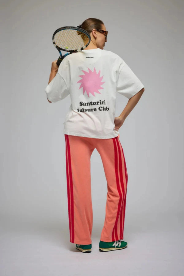 Corfu Terry Pant in Bougainvillea Pink by Araminta James, relaxed wide-leg cotton terry pants with contrasting red velour side panels, elasticated waistband, and side pockets for effortless coastal styling.