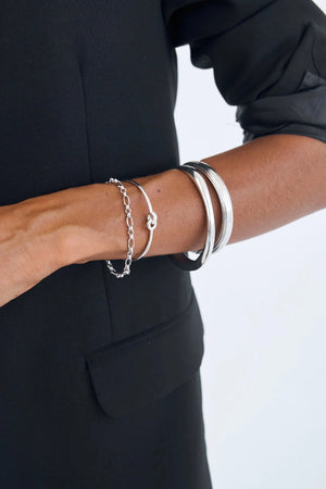 Cristabel Bangle by Avant Studio, an elegant 925 sterling silver oval bangle with minimalist 5mm band. Ideal for daily wear.