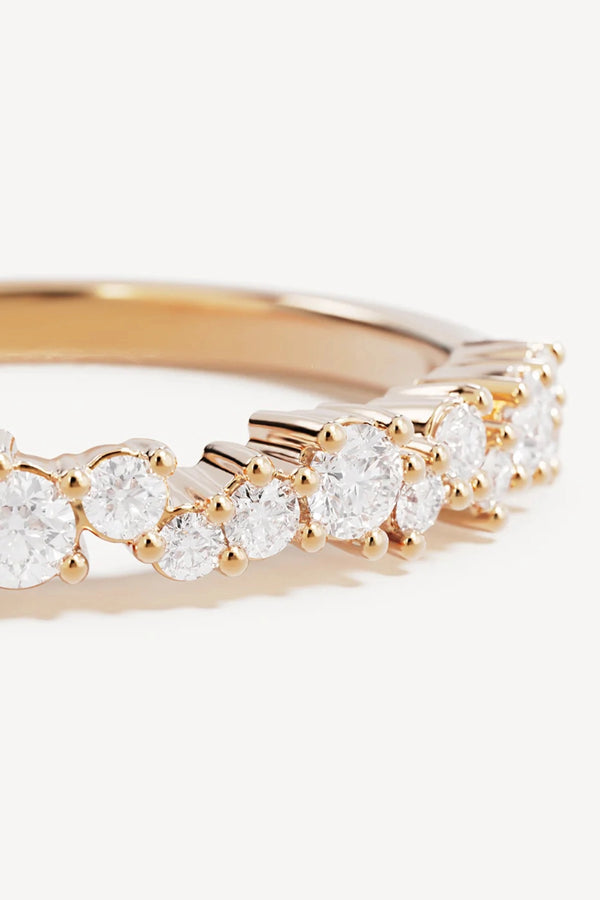 Crystal Dust Fine Ring by By Charlotte – 18k gold vermeil stacking ring with undulating band and sparkling cubic zirconias.