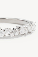 Crystal Dust Fine Ring by By Charlotte – sterling silver stacking ring with undulating band and sparkling cubic zirconias.