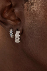 Crystal Dust Hoops by By Charlotte – 18k gold plated hoop earrings with scattered cubic zirconia stones.