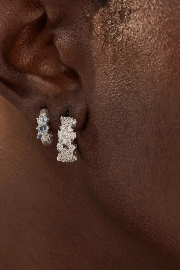 Crystal Dust Hoops by By Charlotte – 18k gold plated hoop earrings with scattered cubic zirconia stones.