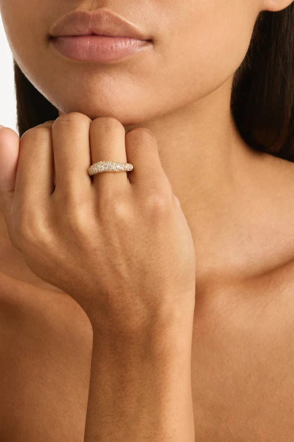 Crystal Wave Ring by By Charlotte — an 18k gold vermeil pavé ring with an undulating wave shape, perfect for elegant everyday styling.