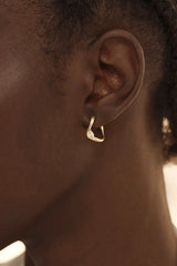 Crystal Wings Hoops by By Charlotte – 18k gold vermeil hoop earrings with marquise cubic zirconia stones.
