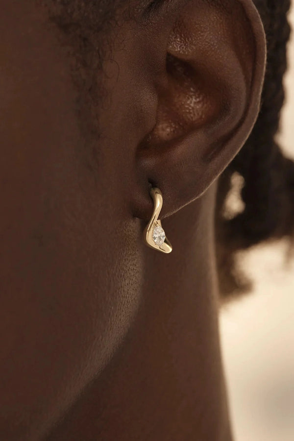 Crystal Wings Hoops by By Charlotte – 18k gold vermeil hoop earrings with marquise cubic zirconia stones.