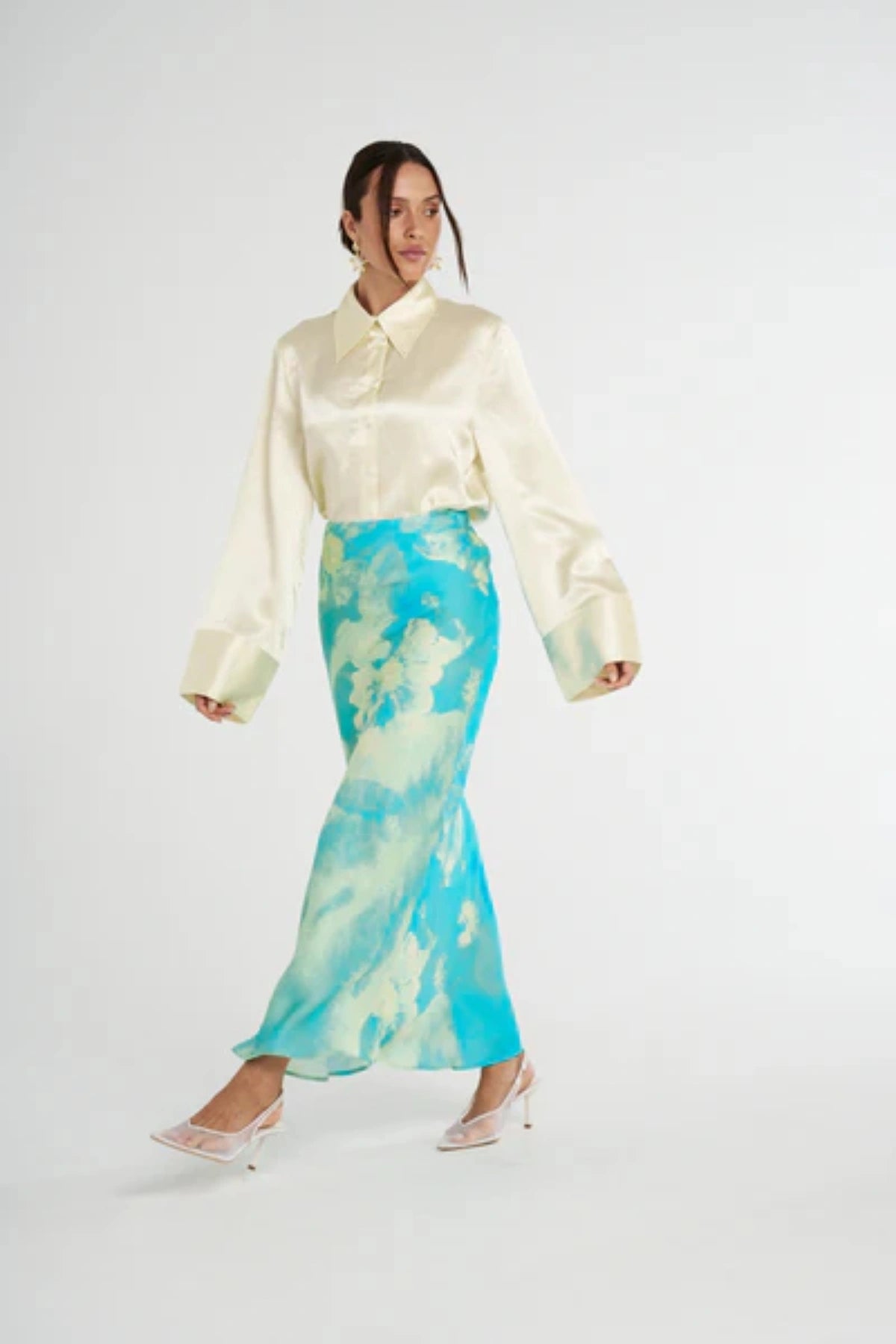 Cuff Shirt Butter by Summi Summi, soft butter-hued shirt with a structured collar and oversized flared cuffs. Lightweight acetate fabric for effortless sophistication.