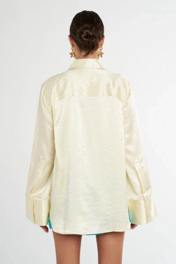 Cuff Shirt Butter by Summi Summi, soft butter-hued shirt with a structured collar and oversized flared cuffs. Lightweight acetate fabric for effortless sophistication.