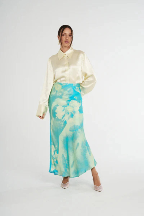 Cuff Shirt Butter by Summi Summi, soft butter-hued shirt with a structured collar and oversized flared cuffs. Lightweight acetate fabric for effortless sophistication.