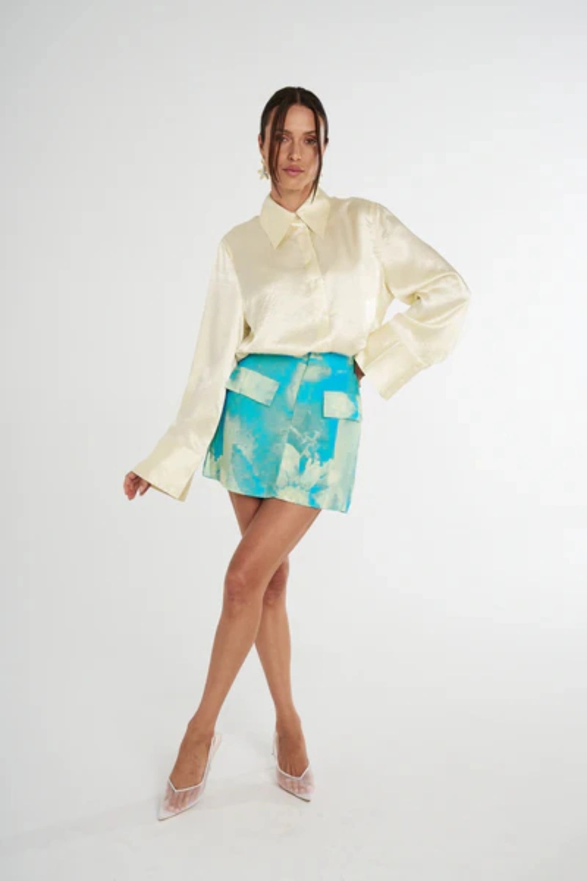 Cuff Shirt Butter by Summi Summi, soft butter-hued shirt with a structured collar and oversized flared cuffs. Lightweight acetate fabric for effortless sophistication.